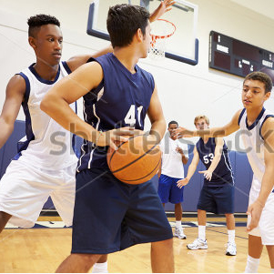 stock-photo-male-high-school-basketball-team-playing-game-199288139new